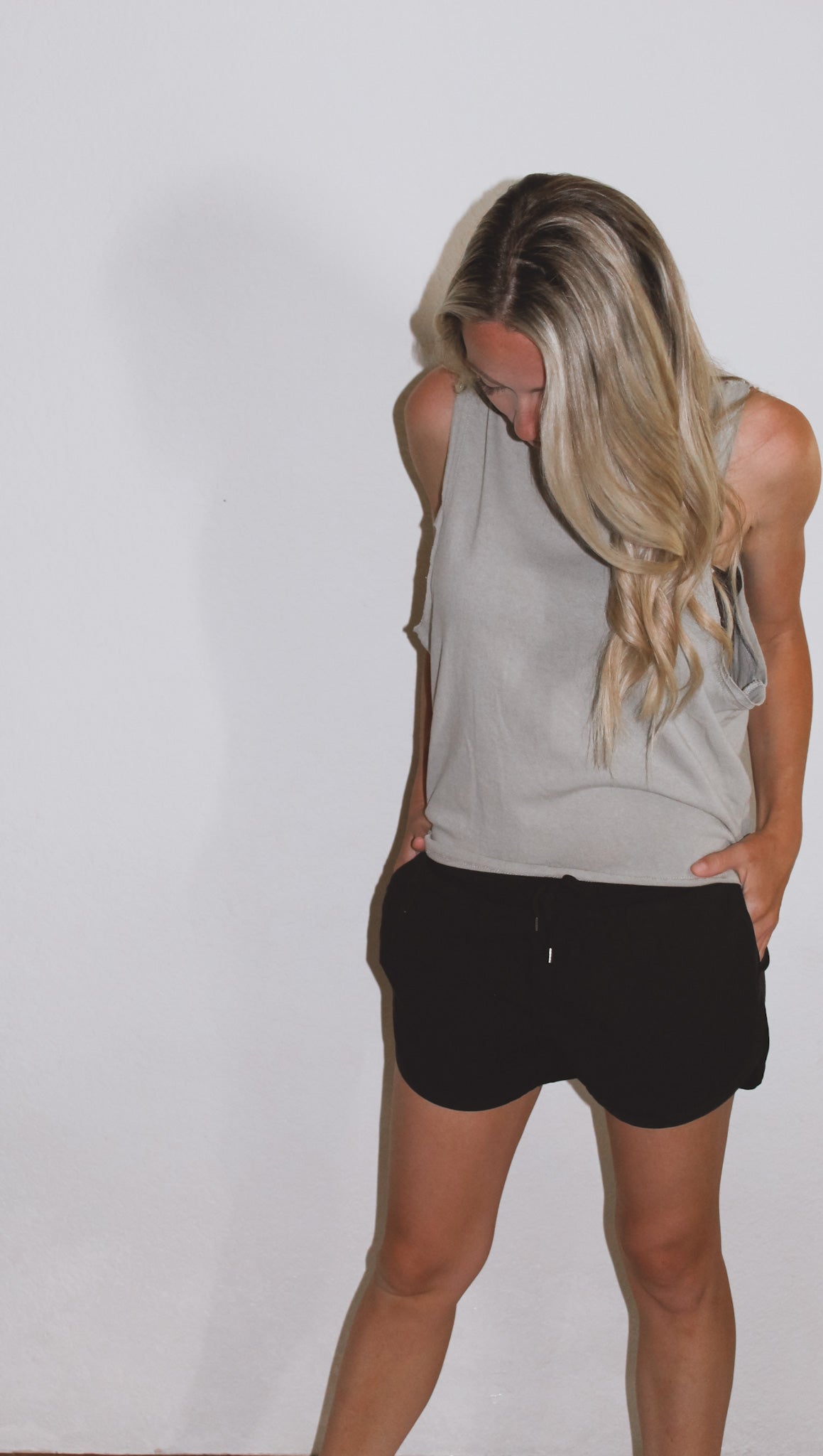 Sage raw hem sleeveless tank