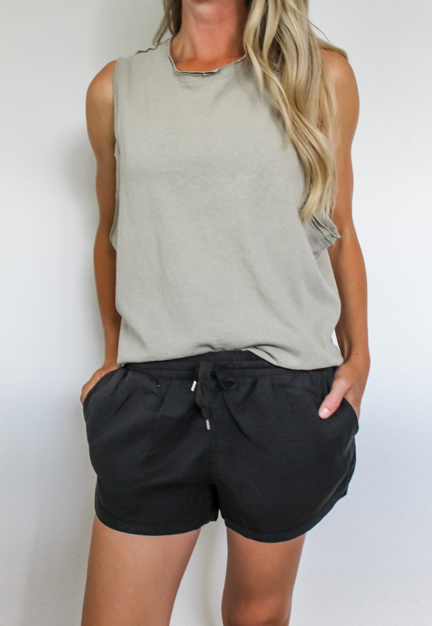 Sage raw hem sleeveless tank
