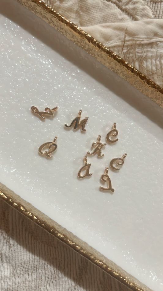 Gold letter charms cursive